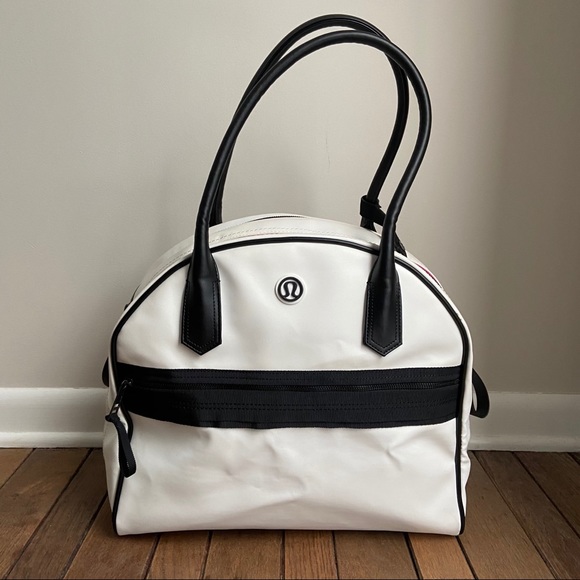 lululemon athletica Handbags - 💕Host pick! LULULEMON white and black duffle bag